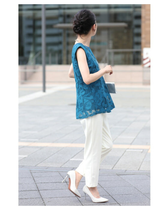 アラベスク模様浮き立つペプラムトップス