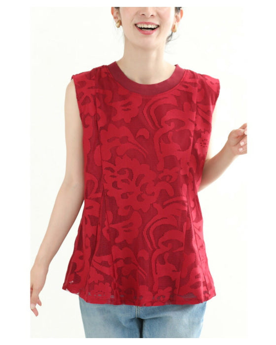 アラベスク模様浮き立つペプラムトップス