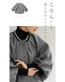 A short outerwear with puffy sleeves