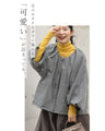 A short outerwear with puffy sleeves