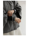A short outerwear with puffy sleeves