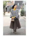 A short outerwear with puffy sleeves