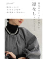 A short outerwear with puffy sleeves