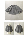 A short outerwear with puffy sleeves