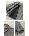 A short outerwear with puffy sleeves