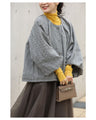 A short outerwear with puffy sleeves