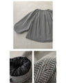 A short outerwear with puffy sleeves