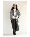 A short outerwear with puffy sleeves