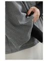 A short outerwear with puffy sleeves