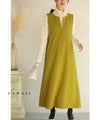 A long dress with a slit neck in ginkgo green