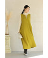 A long dress with a slit neck in ginkgo green