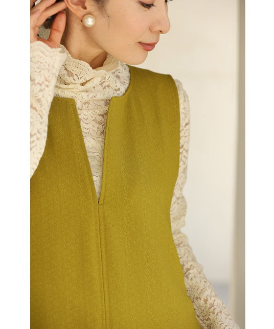 A long dress with a slit neck in ginkgo green