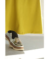 A long dress with a slit neck in ginkgo green