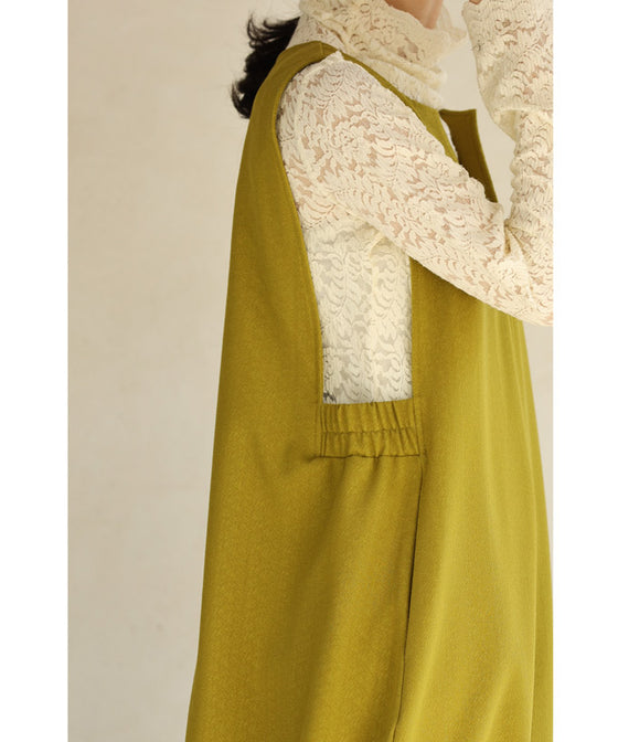 A long dress with a slit neck in ginkgo green