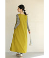 A long dress with a slit neck in ginkgo green