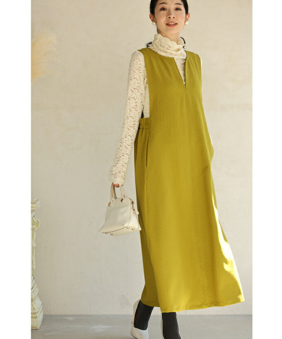 A long dress with a slit neck in ginkgo green