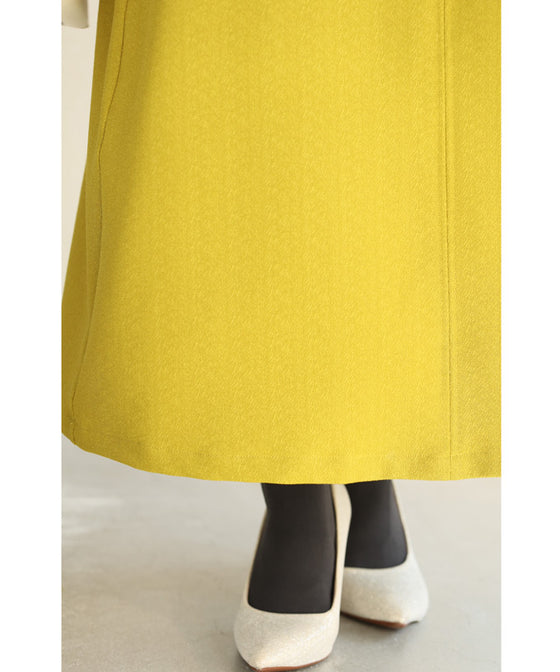 A long dress with a slit neck in ginkgo green