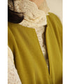 A long dress with a slit neck in ginkgo green