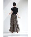 A long skirt with a fluttering animal print art style