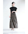 A long skirt with a fluttering animal print art style