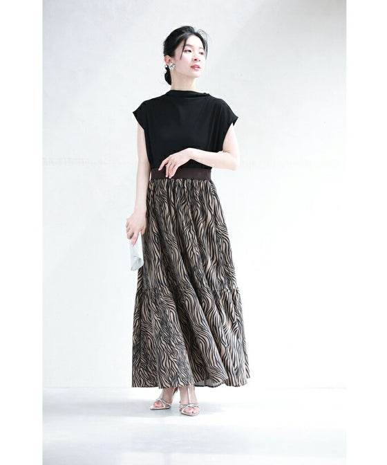 A long skirt with a fluttering animal print art style