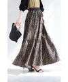 A long skirt with a fluttering animal print art style