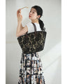 A basket bag made by a lace lover that will get you compliments