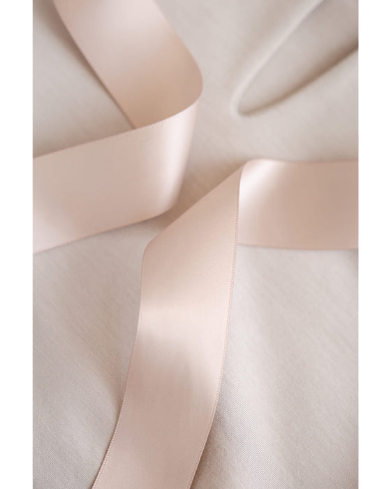 なみなみ裾フリルのバックリボンチュニック