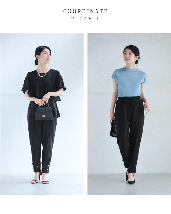 チュールの花が裾に咲くウエストゴムテーパードパンツ