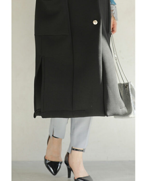 肩を包み込むフリルショルダーロングジレ