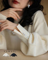 【アウトレット返品交換不可】手元に連なるボタンのポワン袖ニットプルオーバートップス