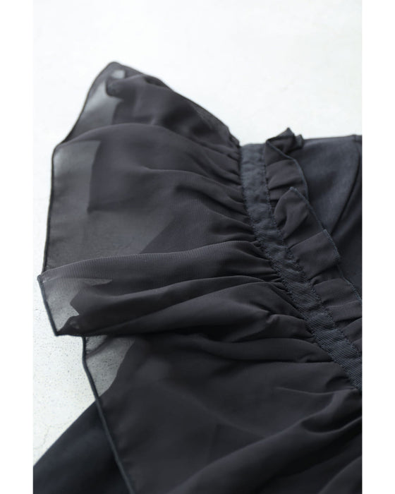 流れるアシンメトリーフリルラインのカットソートップス