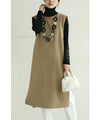 Long vest with side slits and a striking pattern