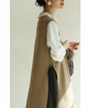 Long vest with side slits and a striking pattern