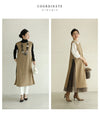 Long vest with side slits and a striking pattern