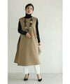 Long vest with side slits and a striking pattern