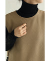 Long vest with side slits and a striking pattern