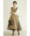 Long vest with side slits and a striking pattern