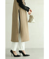 Long vest with side slits and a striking pattern