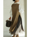 Long vest with side slits and a striking pattern