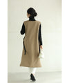 Long vest with side slits and a striking pattern