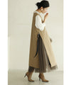 Long vest with side slits and a striking pattern