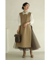 Long vest with side slits and a striking pattern