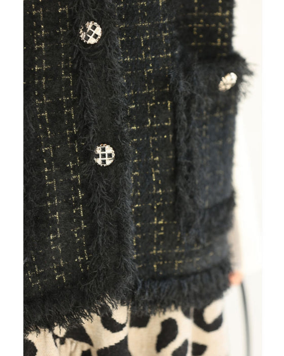 縁取りファーのツイード風デザインニットベスト