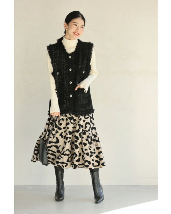 縁取りファーのツイード風デザインニットベスト
