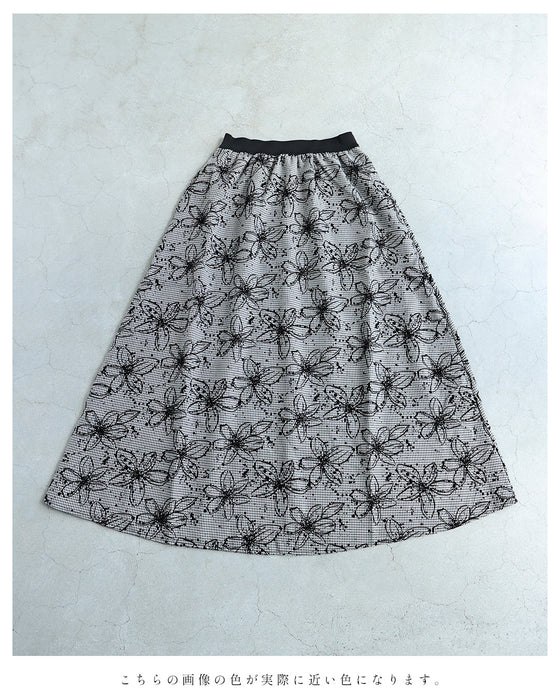 フロッキーの黒花画ロングスカート