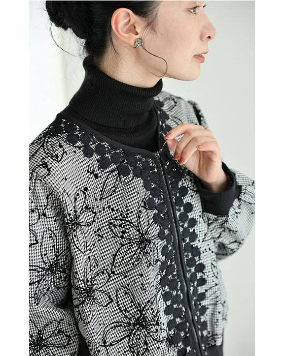 フロッキーの黒花画ブルゾン