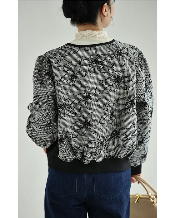 フロッキーの黒花画ブルゾン