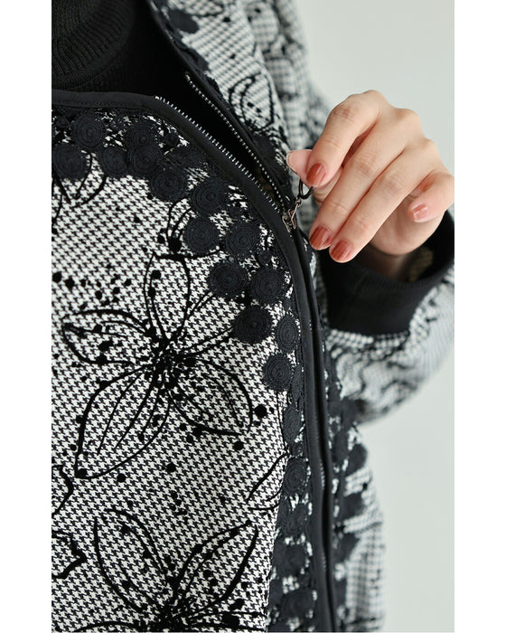 フロッキーの黒花画ブルゾン