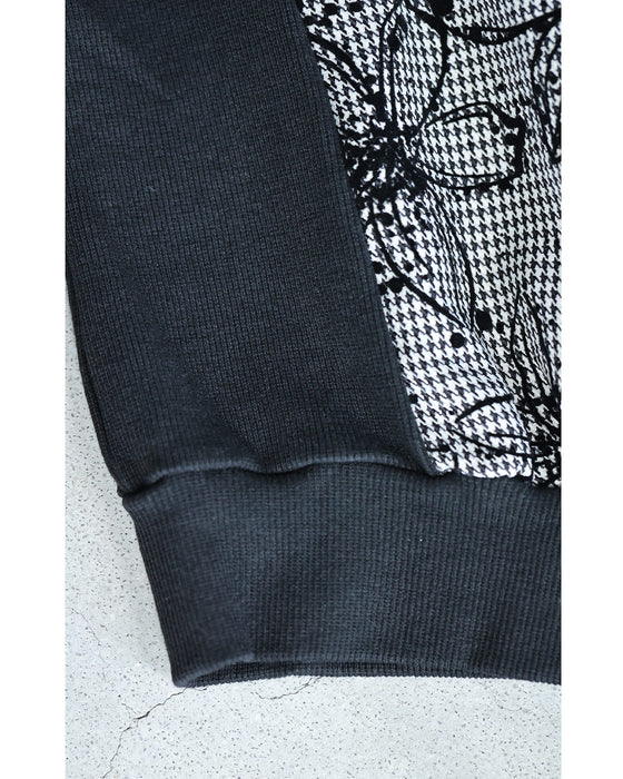 フロッキーの黒花画ブルゾン
